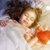 little girl sleeps in the bedroom