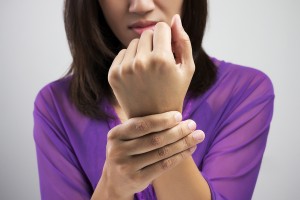 Woman with carpal tunnel syndrome wrist pain
